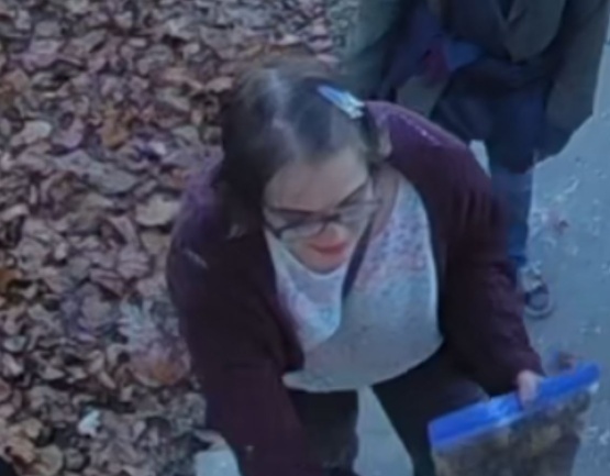 Image pulled from security video showing a woman who cut off her GPS-monitoring bracelet.