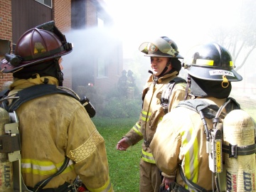Jon Durst and other firefighters outside a training burn