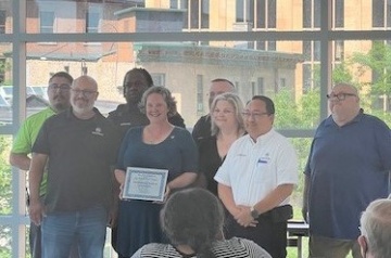 Metro Transit Supervisor Group Receiving #TeamCity Award from Mayor Satya
