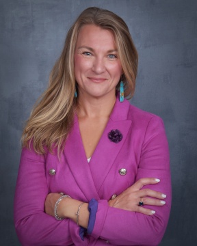 Professional headshot of Jamie Acton