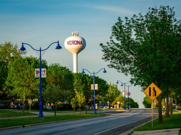 View looking west down Verona Avenue with the Verona Water Tower visible in the background.