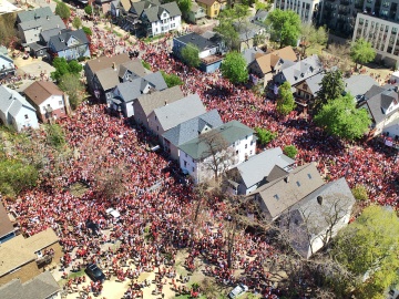 Aerial view showing thousands of people attending the Mifflin Street Block Party.