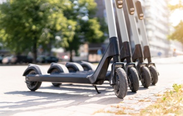 close up of several e-scooters