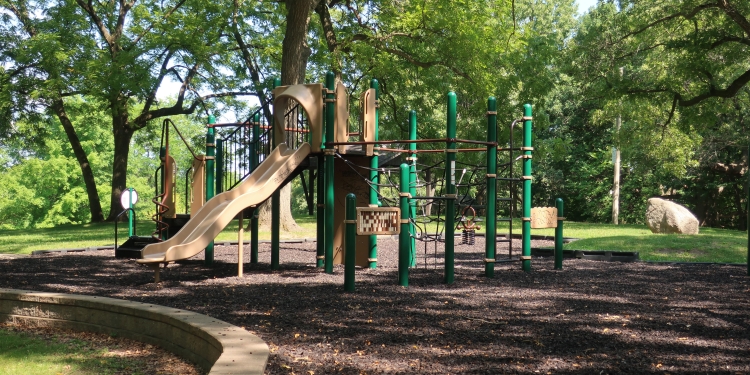 playground in shady Arbor Hills Park