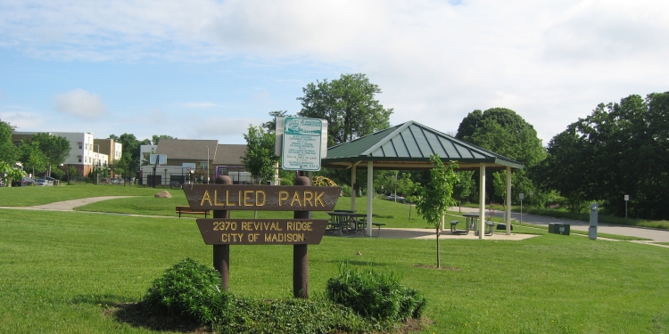 Allied Park sign with gazebo and playground