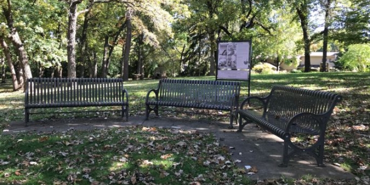 Three metal benches at Hoyt Park.