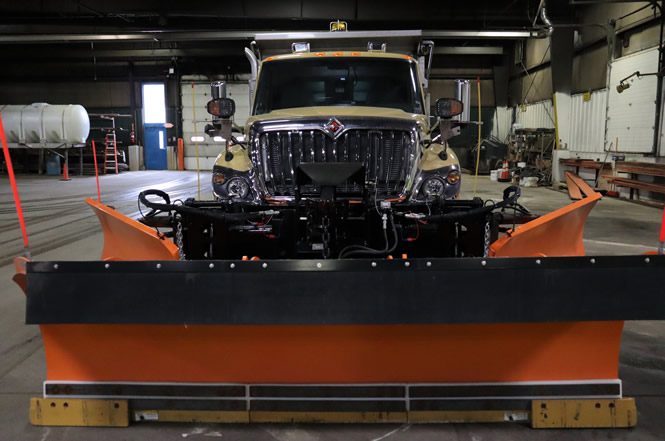 This is plow truck equipped with two wing plows
