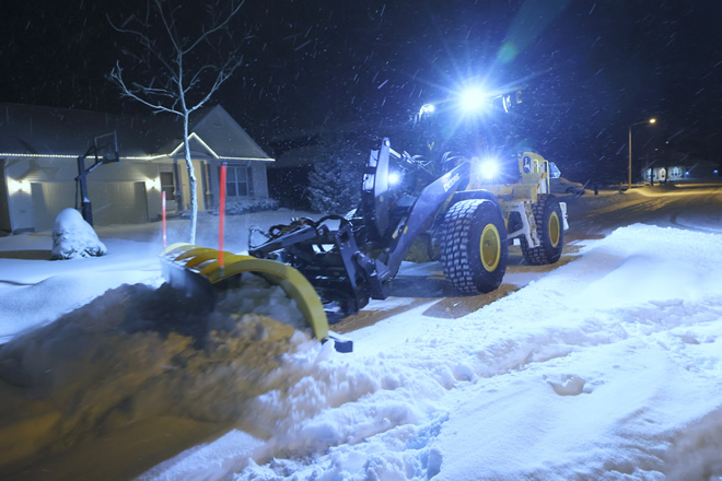 The loader clearing snow